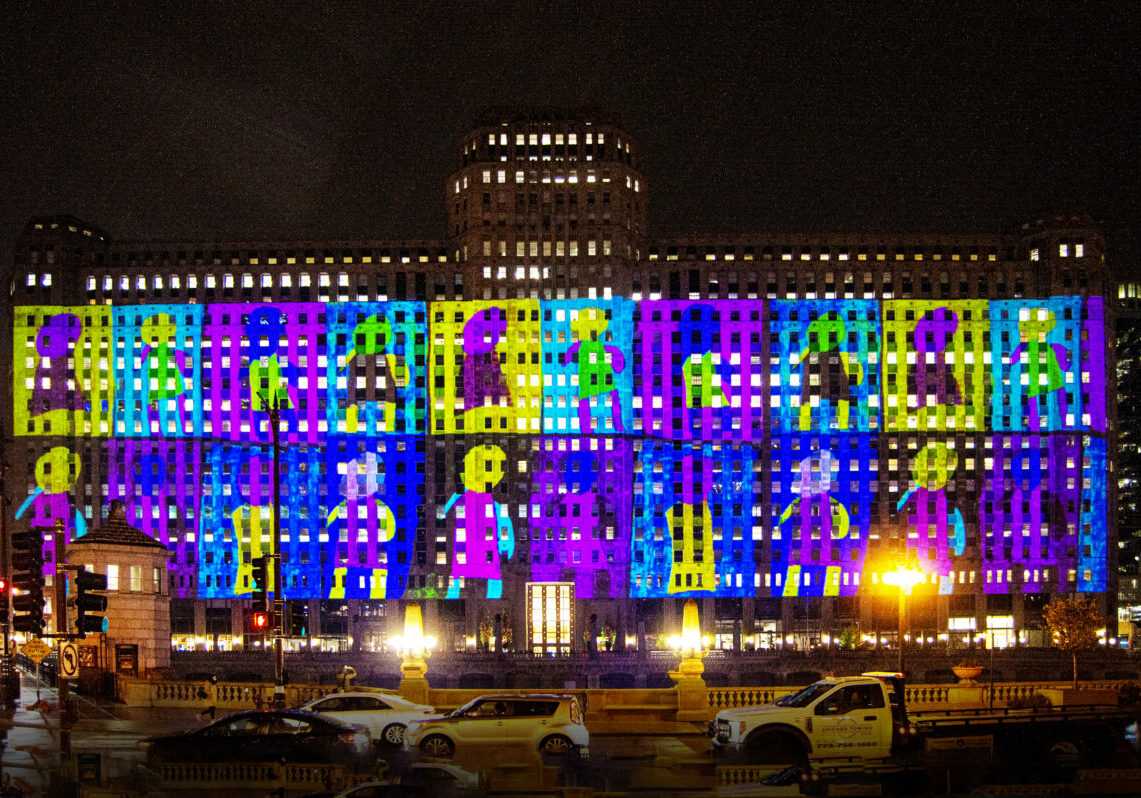 Arts of Life's projection of City Circle Heart on the Merchandise Mart building along the Chicago River