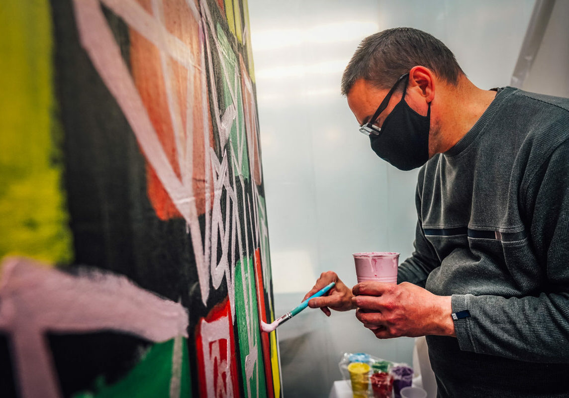 Artist Tim Stone working on a work in progress